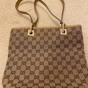 Gucci small tote 9 inches high by 10 inches wide